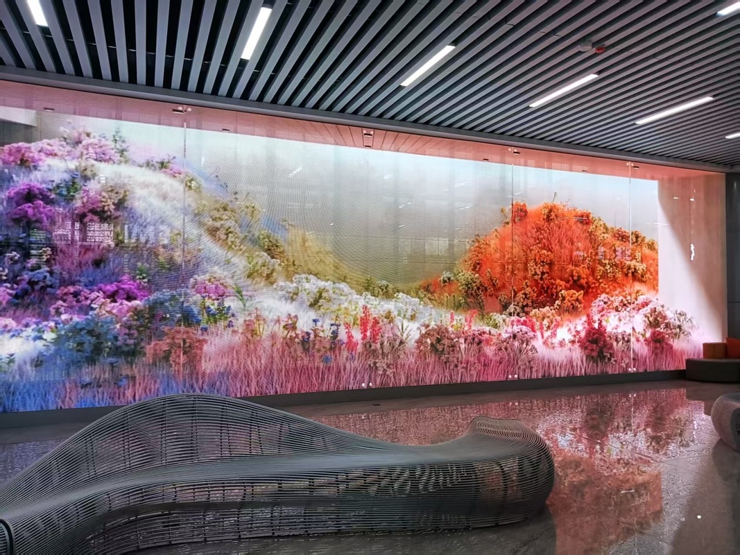 Low Price Customized Full Color Outdoor Transparent LED Grille Screen Waterproof Grid LED Screen